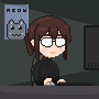 Girl with glasses on a computer saying 